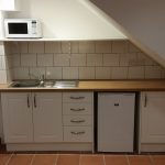 Galley Kitchen installed and tiles and shelf fitted